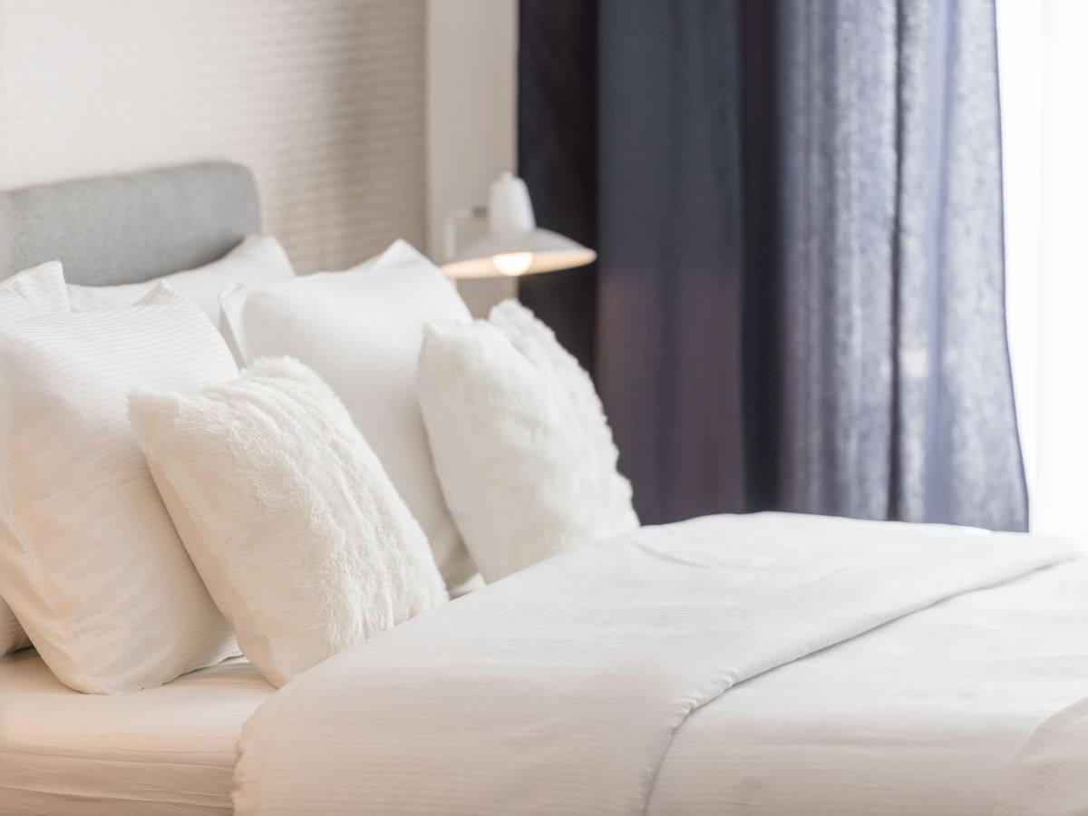 Moody Hues for a Dramatic Bedroom Atmosphere