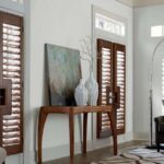 Wood shutters for French doors bring a classic elegance that complements various interior design styles, from rustic farmhouse to sleek modern.