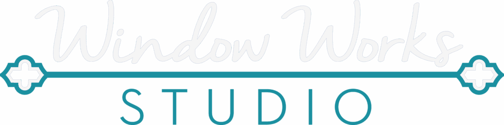 Logo for Window Works Studio with stylized white text and blue background, separated by a teal line with decorative geometric accents at each end.