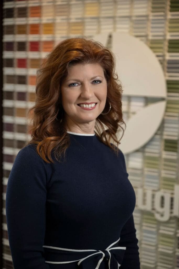 Amy Meinecke, co-owner of Window Works Studio, in their custom window treatment showroom in Jamestown, NC.