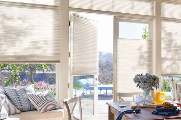 Hunter Douglas Duette® Honeycomb Shades on French doors leading to a patio in Jamestown, NC.