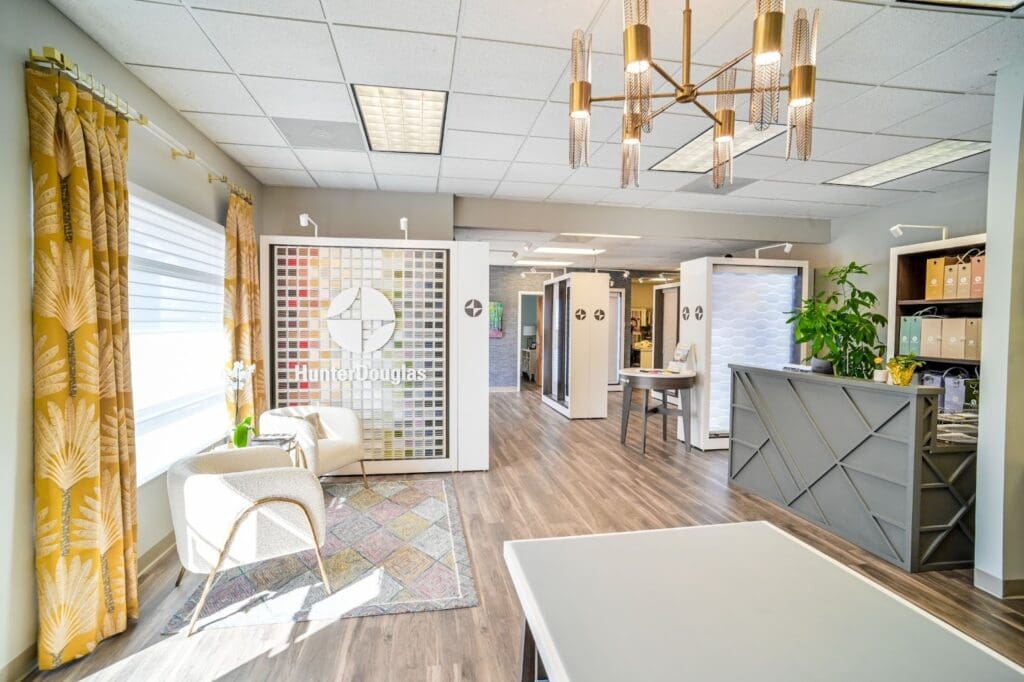 Interior view of the Window Works Studio showroom in Jamestown, NC, featuring Hunter Douglas product displays, fabric samples, and consultation areas.
